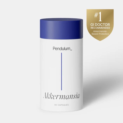 Pendulum Akkermansia supplement container with blue lid on a light gray background