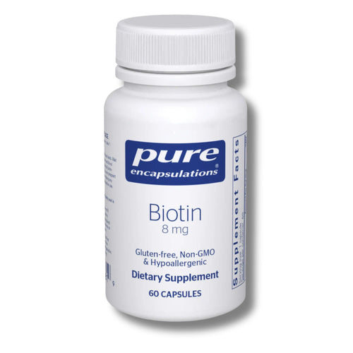 Bottle of Pure Encapsulations Biotin supplement on a white background