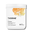 Thorne Creatine pineapple orange flavored supplement bottle on a white background
