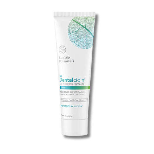 Tube of Dentalcidin Botanicals toothpaste on a white background
