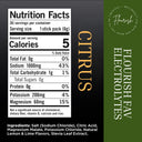 Front-facing product label for Flourish Electromedics Citrus Flavour Electrolytes, showing a Nutrition Facts panel on a black background with a dark green vertical side panel and orange 'CITRUS' text.
