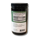 A dark amber supplement jar with a black lid and a green-and-white label showing Supplement Facts, photographed on a plain white background.