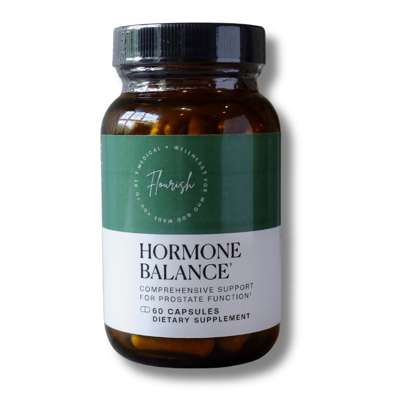 A bottle of Flairish Hormone Balance dietary supplement capsules, featuring an amber glass bottle, a black cap, and a green and white label.