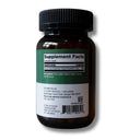 An amber glass supplement bottle with a black ribbed cap and a white-and-green label, shown on a plain white background.