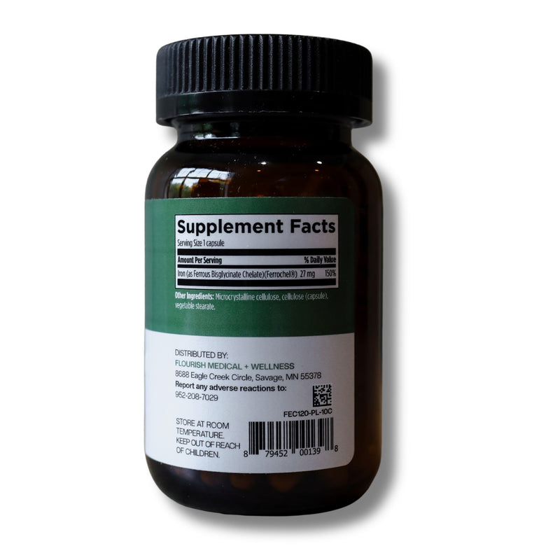 An amber glass supplement bottle with a black ribbed cap and a white-and-green label, shown on a plain white background.