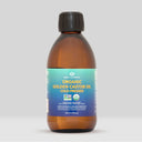 Bottle of organic golden castor oil with a label on a gray background