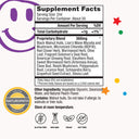 Supplement facts label with a smiley face and colorful dots on a white background