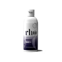 White bottle of rho nutrition supplement on a white background