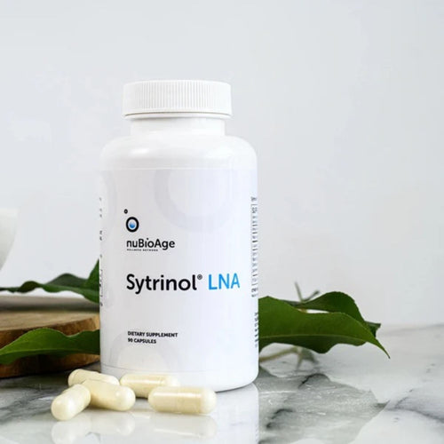 nuBioAge Sytrinol LNA supplement bottle on a counter with sample tablets